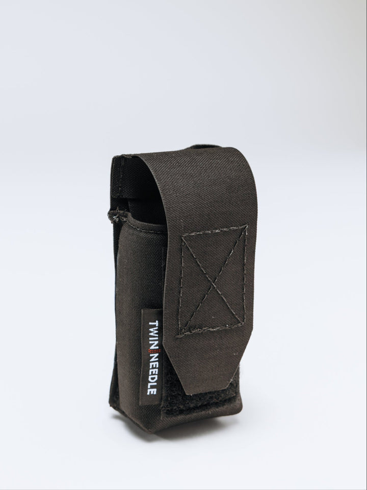 Black pouch with a brand logo on a white background
